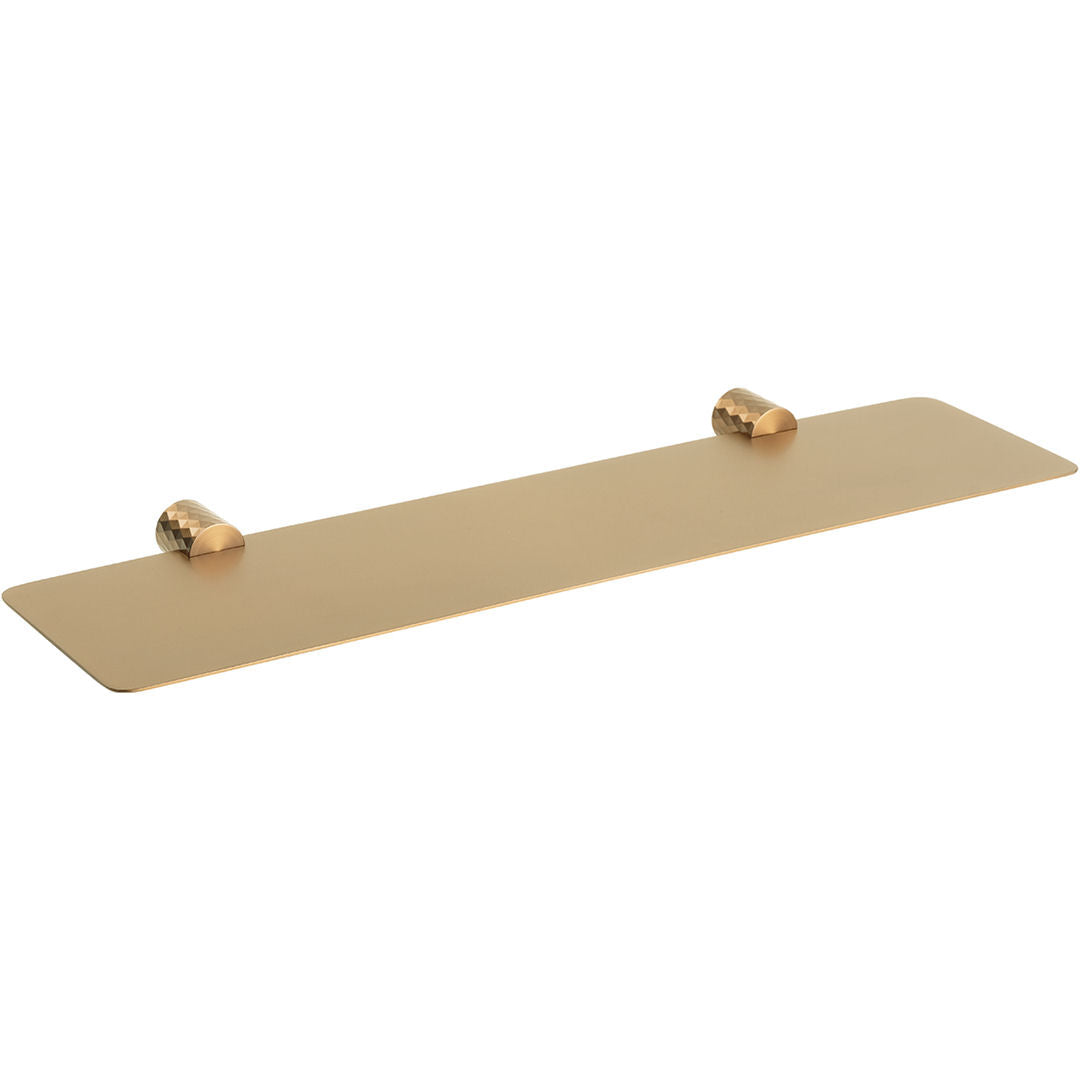 A minimalist rectangular wall-mounted shelf in a brushed brass or matt gold finish