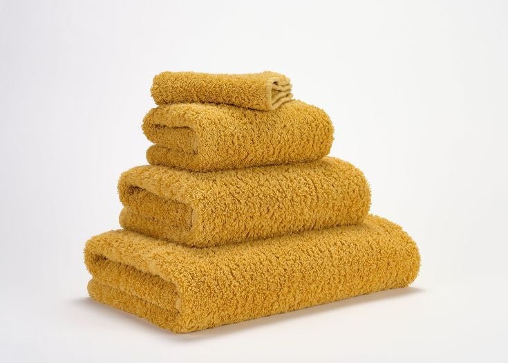 Super Pile Bath Towels by Abyss & Habidecor | 850 Safran - |VESIMI Design| Luxury and Rustic bathrooms online